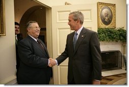 President George W. Bush welcomes President Jalal Talabani of Iraq into the Oval Office, Tuesday, Sept. 13. 2005 at the White House in Washington.  White House photo by Eric Draper