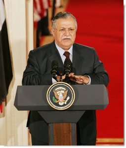 President Jalal Talabani of Iraq, speaks to the media during a joint press availability Tuesday, Sept. 13, 2005, in the East Room of the White House. "It is an honor for me to stand here today as a representative of free Iraq," the President said. "It is an honor to present the world's youngest democracy."  White House photo by Shealah Craighead