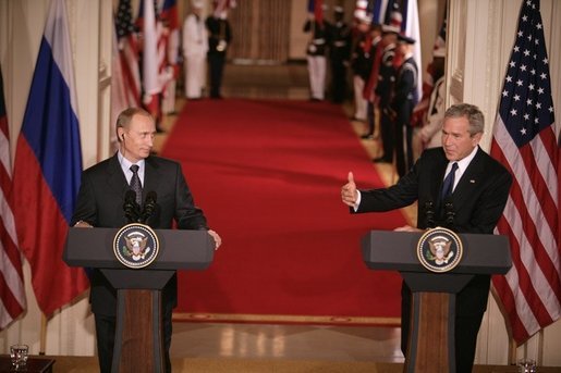 President George W. Bush and Russian President Vladimir Putin appear together at a joint news conference in the East Room of the White House, Friday, Sept. 16, 2005 in Washington, where President Bush thanked Putin for Russia's offers of assistance in the wake of Hurricane Katrina. White House photo by Eric Draper