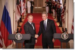 President George W. Bush and Russian President Vladimir Putin shake hands at the conclusion of their joint news conference in the East Room of the White House, Friday, Sept. 16, 2005 in Washington.  White House photo by Eric Draper