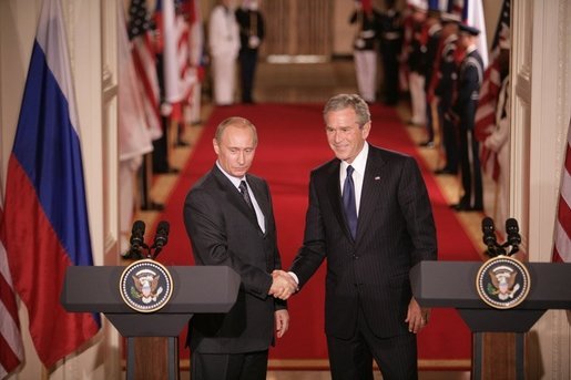 President George W. Bush and Russian President Vladimir Putin shake hands at the conclusion of their joint news conference in the East Room of the White House, Friday, Sept. 16, 2005 in Washington. White House photo by Eric Draper