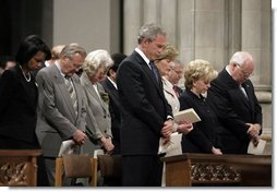 President George W. Bush bows his head in prayer during the National Day of Prayer and Remembrance Service at the Washington National Cathedral in Washington, D.C., Friday, Sept. 16, 2005. Also pictured are Laura Bush, Lynne Cheney Vice President Cheney, Secretary Rice and Secretary Rumsfeld.  White House photo by Eric Draper