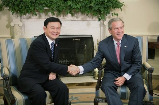 President George W. Bush shakes hands with Thailand's Prime Minister Thaksin Shinawatra, during a visit to the Oval Office at the White House, Monday, Sept. 19, 2005 in Washington. White House photo by Eric Draper
