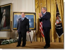 President George W. Bush applauds Korean War era veteran Corporal Tibor "Ted" Rubin, after awarding Rubin the Medal of Honor, Friday, Sept. 23, 2005 at cermonies at the White House in Washington. Rubin was honored for his actions under fire, and his bravery while in captivity at a Chinese POW camp.  White House photo by Paul Morse