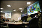 President George W. Bush receives a briefing on Hurricane Rita Friday, Sept. 23, 2005 inside NORAD's U.S. Northern Command at Peterson Air Force Base in Colorado Springs, Colorado. White House photo by Eric Draper