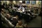 President George W. Bush receives a briefing with personnel from all branches of the military on Hurricanes Katrina and Rita inside NORAD's United States Northern Command in Colorado Springs, Colorado, Saturday, Sept. 24, 2005. White House photo by Eric Draper