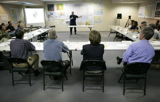 President George W. Bush and Louisiana officials participate in a briefing on Hurricane Rita at the FEMA Joint Field Office in Baton Rouge, Louisiana, Sunday, Sept. 25, 2005. White House photo by Eric Draper