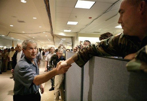 President George W. Bush thanks emergency personnel inside the FEMA Joint Field Office in Baton Rouge, Louisiana, Sunday, Sept. 25, 2005. White House photo by Eric Draper