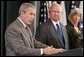 President George W. Bush, appearing at the U.S. Department of Energy, Monday, Sept. 26, 2005 in Washington, talks about the effects of Hurricane Rita on the energy situation in the Gulf of Mexico. President Bush is joined by U.S. Energy Secretary Samuel W. Bodman and U.S. Interior Secretary Gale Norton.  White House photo by Paul Morse