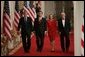 President George W. Bush walks with Judge John Roberts, his wife, Jane Marie Sullivan Roberts, and Associate Justice John Paul Stevens to the East Room of the White House Thursday, Sept. 29, 2005, where Judge Roberts was sworn in as Chief Justice of the United States. White House photo by Paul Morse