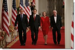 President George W. Bush walks with Judge John Roberts, his wife, Jane Marie Sullivan Roberts, and Associate Justice John Paul Stevens to the East Room of the White House Thursday, Sept. 29, 2005, where Judge Roberts was sworn in as Chief Justice of the United States.  White House photo by Paul Morse
