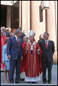 President George Bush walks out of St. Matthew's Cathedral with Cardinal Theodore McCarrick and Supreme Court Chief Justice John Roberts after attending the 52nd Annual Red Mass in Washington, DC, Sunday, October 2, 2005. The Red Mass, a historical tradition within the Catholic Church, is held on the Sunday before the opening session of the Supreme Court. White House photo by Shealah Craighead