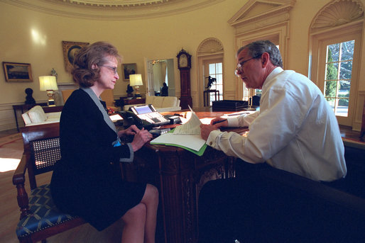 President George W. Bush and Harriet Miers are shown in the Oval Office in this Jan. 22, 2001 file photo. White House photo by Eric Draper