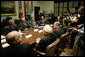 President George W. Bush meets with company representatives of vaccine manufacturers Friday, Oct. 7, 2005, in the Roosevelt Room of the White House. White House photo by Eric Draper