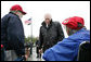 Vice President Dick Cheney talks with veterans of the 526th Armored Infantry Battalion Friday, Oct. 7, 2005, after delivering remarks during a wreath-laying ceremony at the National World War II Memorial in Washington D.C. ".You served honorably in a desperate era for our country. And in pivotal hours of the Second World War, the 526th Armored Infantry Battalion was a valiant unit.One of the great strengths of this country is the unselfish courage of the citizen who steps forward, puts on the uniform, and stands ready to go directly into the face of danger," said the Vice President during his remarks. The ceremony was in honor of the 526th Armored Infantry Battalion which is the sole remaining, separate armored infantry battalion from World War II, whose soldiers defended the Belgian villages of Stavelot and Malmedy on December 16, 1944, the first day of the Battle of the Bulge. White House photo by David Bohrer