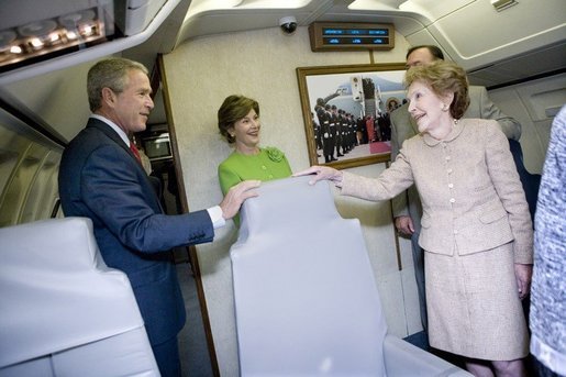 President George W. Bush, Mrs. Bush and Nancy Reagan tour the plane that served as Air Force One for President Reagan and six other Presidents from 1973 to 2001 at the Ronald Reagan Presidential Library in Simi Valley, California, Friday, Oct. 21, 2005. White House photo by Eric Draper