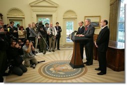 President George W. Bush is joined by Alan Greenspan, left, Chairman of the Federal Reserve, as he announces his nomination Monday, Oct. 24, 2005, of Ben Bernanke, right, as the new Chairman, to replace Mr. Greenspan when he retires in January. Said the President, "Ben Bernanke is the right man to build on the record Alan Greenspan has established.  White House photo by Paul Morse
