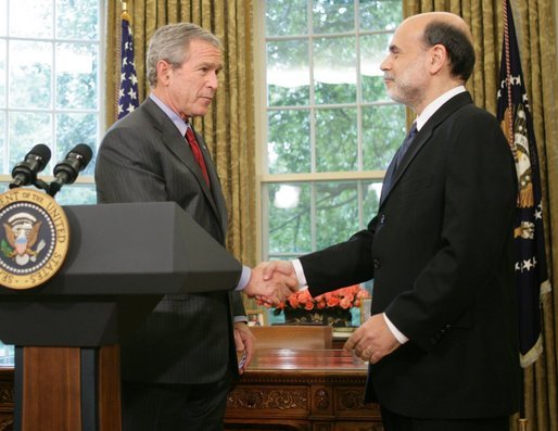 President George W. Bush shakes the hand of Ben Bernanke after announcing his decision to nominate Mr. Bernanke as Chairman of the Federal Reserve, replacing Alan Greenspan upon his retirement in January 2006. The announcement came Monday, Oct. 24, 2005, in the Oval Office. White House photo by Paul Morse