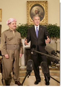 President George W. Bush talks to reporters as he welcomes Massoud Barzani, the President of the Kurdistan regional government of Iraq, to the Oval Office at the White House, Tuesday, Oct. 25, 2005.  White House photo by Eric Draper