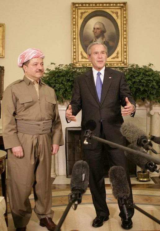 President George W. Bush talks to reporters as he welcomes Massoud Barzani, the President of the Kurdistan regional government of Iraq, to the Oval Office at the White House, Tuesday, Oct. 25, 2005. White House photo by Eric Draper