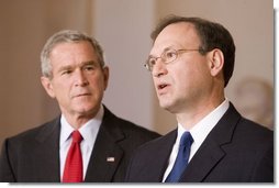 With President George W. Bush looking on, Judge Samuel A. Alito acknowledges his nomination Monday, Oct. 31, 2005, as Associate Justice of the U.S. Supreme Court.  White House photo by Paul Morse