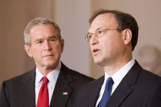 With President George W. Bush looking on, Judge Samuel A. Alito acknowledges his nomination Monday, Oct. 31, 2005, as Associate Justice of the U.S. Supreme Court. White House photo by Paul Morse