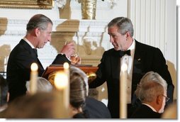 President George W. Bush and the Prince of Wales toast one another during a dinner at the White House, Wednesday evening, Nov. 2, 2005.  White House photo by Krisanne Johnson
