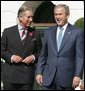 President George W. Bush and the Prince of Wales are seen together at the official welcome for the Prince and Duchess of Cornwall, at the White House, Wednesday, Nov. 2, 2005. White House photo by Paul Morse