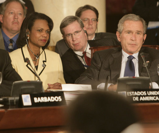 President George W. Bush, Secretary of State Condoleezza Rice and National Security Council Advisor Steve Hadley listen to opening statements Friday, Nov. 4, 2005, at the Summit of the Americas in Mar del Plata, Argentina. White House photo by Eric Draper