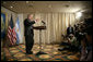 President George W. Bush meets with the traveling press pool Friday, Nov. 4, 2005, at the Sheraton Mar del Plata in Mar del Plata, Argentina. The President thanked the media for coming and said he was pleased to be in Argentina. White House photo by Eric Draper