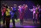 Performers move under the lights at Teatro Auditorium Friday, Nov. 4, 2005, as the opening ceremonies of the 2005 Summit of the Americas got under way in Mar del Plata, Argentina. White House photo by Eric Draper