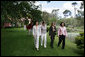 Mrs. Laura Bush walks with women leaders during her visit Friday, Nov. 4, 2005, to Estancia Santa Isabel, a ranch near Mar del Plata, site of the 2005 Summit of the Americas. White House photo by Krisanne Johnson