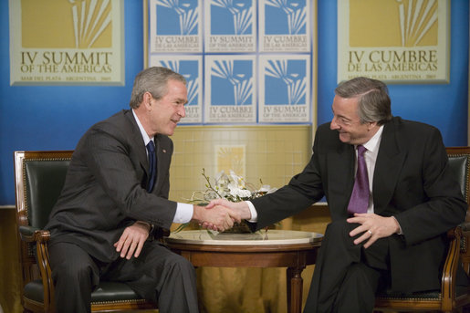 President George W. Bush and President Nestor Carlos Kirchner of Argentina shake hands after their meeting Friday morning, Nov. 4, 2005, at the Hermitage Hotel in Mar del Plata, Argentina. White House photo by Eric Draper