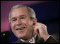President George W. Bush reacts during a joint press availability with the President Martin Torrijos of Panama at Casa Amarilla in Panama City, Panama, Monday, Nov. 7, 2005. White House photo by Eric Draper