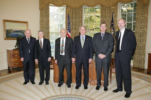 President George W. Bush meets with the 2005 Nobel Prize recipients, Tuesday, Nov. 8, 2005 in the Oval Office at the White House. From left to right are Dr. John Hall, 2005 Nobel Prize in Physics; Dr. Thomas C. Schelling, 2005 Nobel Prize in Economic Sciences; Dr. Roy J. Glauber, 2005 Nobel Prize in Physics; Dr. Richard R. Schrock and Dr. Robert H. Grubbs, 2005 Nobel Prize winners in Chemistry. White House photo by Paul Morse
