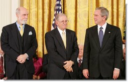 President George W. Bush stands with Presidential Medal of Freedom recipients, Vinton G. Cerf and Robert E. Kahn, Wednesday, Nov. 9, 2005, during ceremonies at the White House. Cerf and Kahn were honored for their work in helping to create the modern Internet. White House photo by Paul Morse 