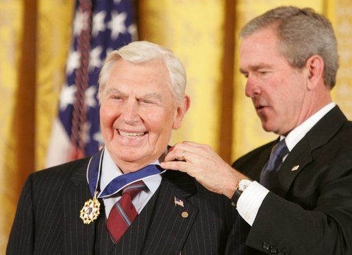 President George W. Bush presents the Presidential Medal of Freedom to actor Andy Griffith, one of 14 recipients of the 2005 Presidential Medal of Freedom, awarded Wednesday, Nov. 9, 2005 in the East Room. White House photo by Paul Morse