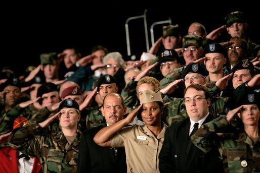 Staff and Army personnel welcome President George W. Bush, during his introduction, Friday, Nov. 11, 2005 at the Tobyhanna Army Depot in Tobyhanna, Pa. White House photo by Eric Draper