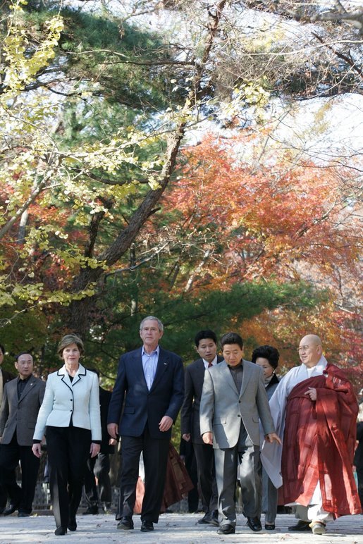 President George W. Bush and Laura Bush arrive at the Bulguksa Temple Thursday, Nov. 17, 2005, in Gyeongju, Korea with Korean President Moo Hyun Roh and his wife Yang-Sook Kwon. White House photo by Shealah Craighead