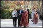 President George W. Bush and Laura Bush are welcomed to Bulguksa Temple by Juji Sunim, the chief monk, during their visit Thursday, Nov. 17, 2005, to Gyeongju, Korea. White House photo by Shealah Craighead