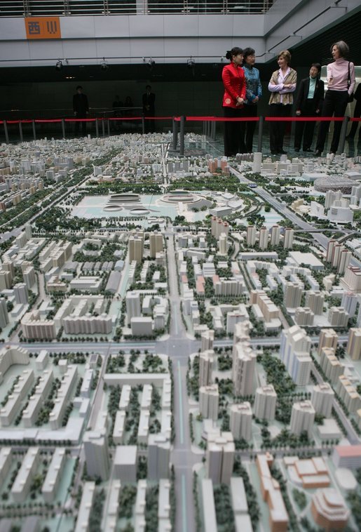 A model of the future Beijing sits in the foreground as Mrs. Bush and Sarah Randt, wife of the U.S. Ambassador to China, tour the Beijing Urban Planning Museum Sunday, Nov. 20, 2005, in Beijing. White House photo by Shealah Craighead