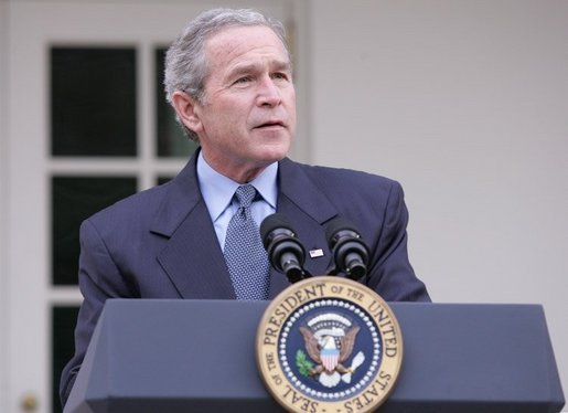 President George W. Bush is seen in the Rose Garden of the White House, Friday, Dec. 2, 2005, as he speaks on the growth of the economy with news of 215,000 jobs added for the month of November and third-quarter growth this year was 4.3 percent. White House photo by Paul Morse