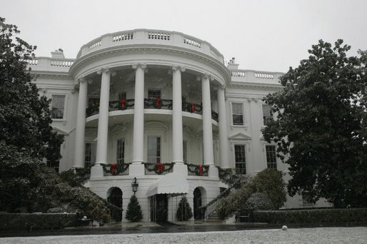 A thin blanket of snow wraps the White House for the Holiday season Monday, Dec. 5, 2005. White House photo by Shealah Craighead