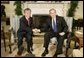 President George W. Bush welcomes Dr. Lee Jong-wook, the Director-General of the World Health Organization, to the Oval Office, Tuesday, Dec. 6, 2005. White House photo by Eric Draper