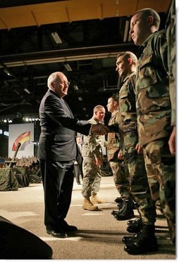 Vice President Dick Cheney congratulates troops during a Re-enlistment Ceremony at Fort Drum, N.Y., Tuesday, Dec. 6, 2005. During his visit, the Vice President also participated in a Purple Heart Award Ceremony and met one-on-one with troops.  White House photo by David Bohrer