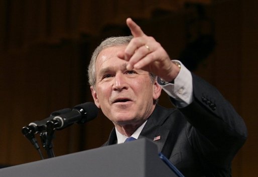 President George W. Bush points to a member of the audience during a question and answer segment, after delivering remarks on the War on Terror before members of the World Affairs Council of Philadelphia, Monday, Dec. 12, 2005. White House photo by Eric Draper