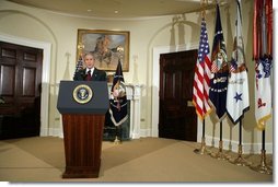 President George W. Bush delivers live radio address from the Roosevelt Room in the White House, Saturday, December 17, 2005.  White House photo by Kimberlee Hewitt