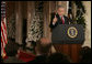 President George W. Bush emphasizes a point as he responds to a reporter's question Monday, Dec. 19, 2005, during a news conference in the East Room of the White House. White House photo by Kimberlee Hewitt