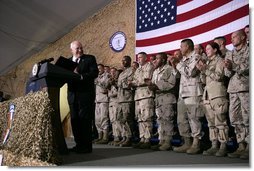 Vice President Dick Cheney receives a welcome from the troops at a rally at Bagram Air Base, Afghanistan Monday, Dec. 19, 2005.  White House photo by David Bohrer