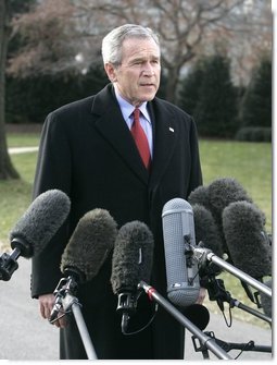President George W. Bush speaks to the media Thursday, Dec. 22, 2005, on the South Lawn of the White House before leaving for Camp David. The President spoke about the Patriot Act extension saying, "We're still under threat, there's still an enemy that wants to harm us and they understand the Patriot Act is an important tool for those of us here in the Executive Branch to use to protect our fellow citizens."  White House photo by Kimberlee Hewitt